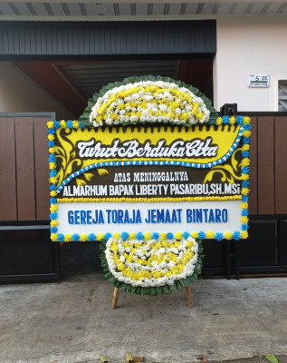 Papan Bunga Duka di Tanah Tinggi